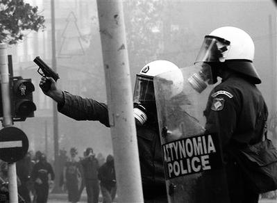 MAT policeman aiming at protesters during the Athens Riots (December 2008)